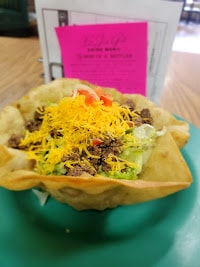 Crispy taco shell with toppings