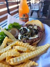 Beer, sandwich and fries