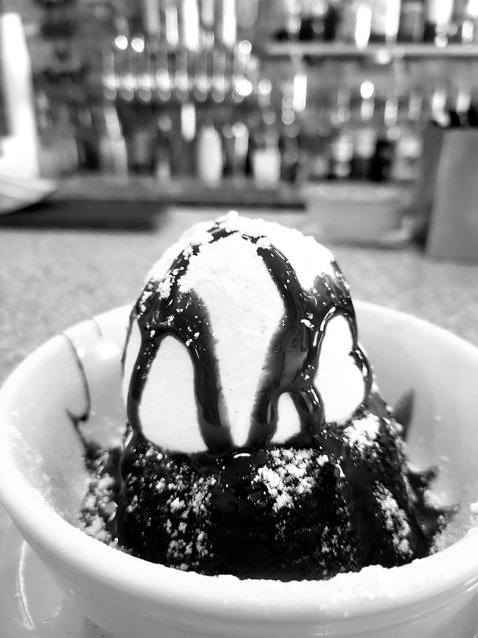 Ice cream scoop with chocolate sauce