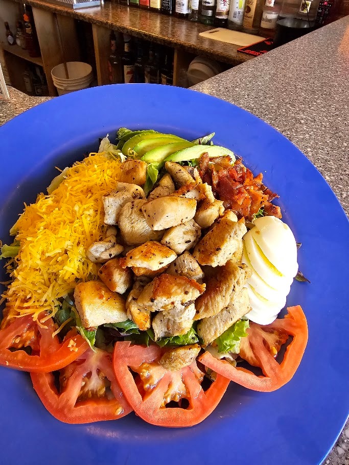Grilled chicken plate with rice and vegetables