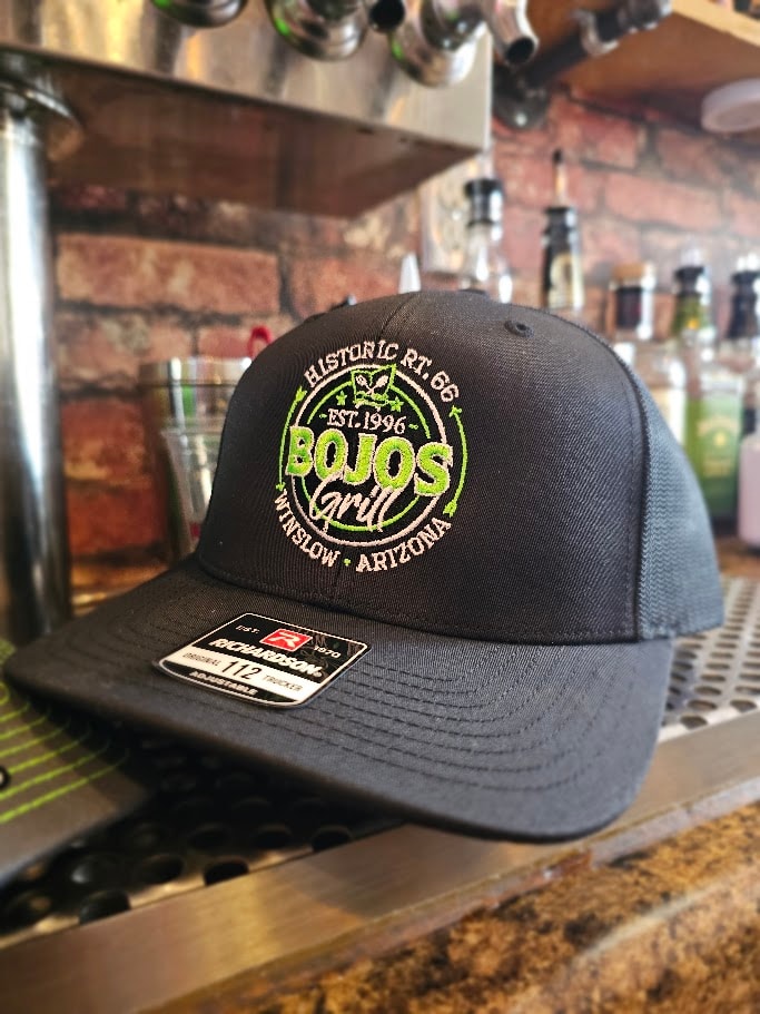 Bojo's Grill cap on counter